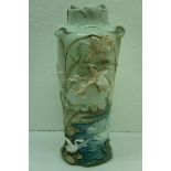 Art Nouveau porcelain vase with decoration of iris and swans in relief. Ht. 11 ins.