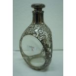 Sterilng silver and clear glass drunkard's grip decanter with prunus decoration