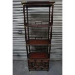 20thC Chinese cherrywood four-tier what-not with brass mounts, three drawers and cupboard under. Ht.