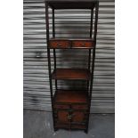 Four-tier Chinese what-not similar to previous lot, with four drawers and cupboard under. Ht. 62