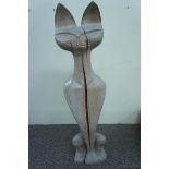 Large carved wooden figure of an Oriental seated cat. Ht. 40 ins.