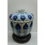 19thC Chinese blue and white porcelain jar with cover having floral decoration in panels around body