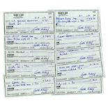 Lot of 10 Arthur Ashe Checks