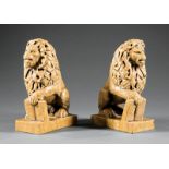 Pair of Carved Sienne Marble Seated Lions