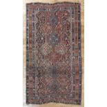 Antique Persian Shiraz Carpet, red and blue ground, repeating designs within diamonds, triple