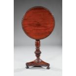 Fine Anglo-Colonial Carved Rosewood Tilt-Top Table, 19th c., circular top with egg and dart molding,