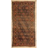 Four Small Antique Belouchistan Rugs, red and orange grounds, repeating floral and gull designs, 2