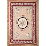 Aubusson-Style Carpet, pink and red ground, central rosette, floral motifs, 9 ft. 10 in. x 12 ft.