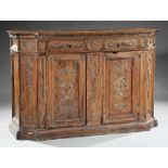 Italian Baroque Carved Walnut Credenza, mid-16th c. with later elements, dentil molded top, five