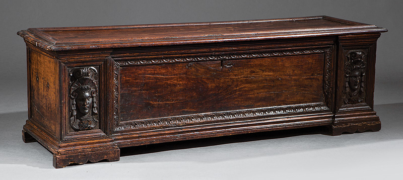 Italian Renaissance Carved Walnut Cassone, 17th c., molded lift top, panels, molded base, blocked