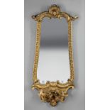 Pair of Antique Italian Carved Giltwood Girandole Mirrors, shell and acanthus crests, shaped