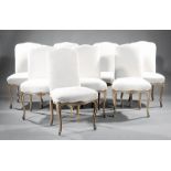 Eight Louis XV-Style Creme Peinte Dining Chairs, shaped padded backs, serpentine seat rail,