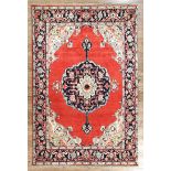 Persian Serapi Carpet, red ground with central medallion, vining floral spandrels and border, 6