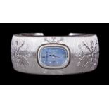 Buccellati 18 kt. White Gold Lady's Cuff Watch, abalone face, quartz movement, floral engraving, wt.