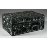 Anglo-Indian Carved Ebony Dresser Box, 19th c., carved foliate decoration throughout, interior