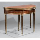 Directoire Brass-Mounted Mahogany Demilune Games Table, 19th c., triple folding top, paneled frieze,