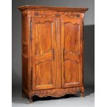 Louis XVI Walnut Armoire, 18th c., molded cornice, basket of flowers frieze, scalloped doors, fitted