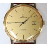 A gents Zenith quartz wristwatch in 18ct gold case, with batons denoting hours and date aperture, on