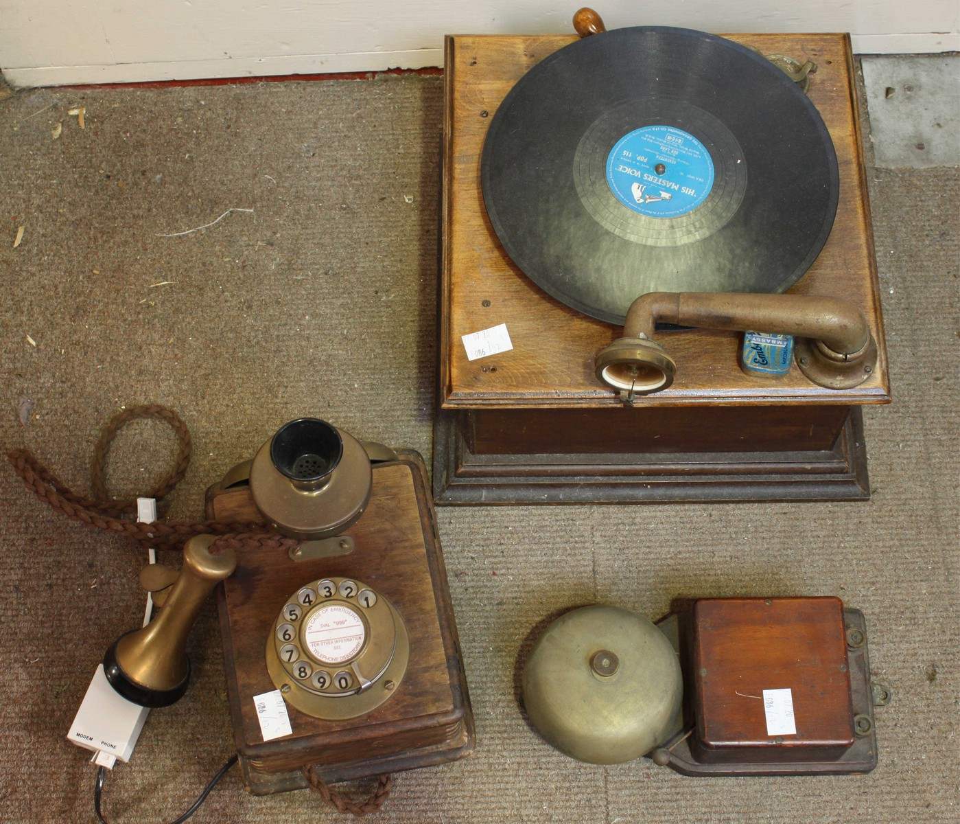 A G&T Limited early model hornless gramophone, together with an early wall mounted telephone and