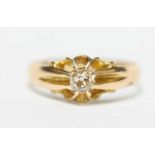 An 18ct gold solitaire diamond ring claw set with approximately quarter carat diamond, total