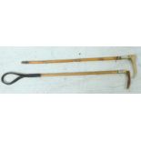 Two antler handled riding crops, one with silver mount. (2)