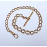 An 18ct gold graduated curb link Albert chain, the links, T-bar and end clips hallmarked 18ct and