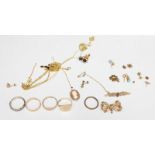 A small quantity of assorted 9ct and yellow metal jewellery items including a 9ct gold bow