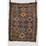 Derbend rug, east Caucasus, early 20th century, 5ft. 11in. x 4ft. 5in. 1.80m. x 1.35m. Overall wear;