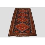 Good Luri carpet, Fars, south west Persia, circa 1920s-30s, 11ft. 7in. x 6ft. 5in. 3.53m. x 1.96m.