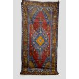Taspinar long rug, south central Anatolia, mid-20th century, 9ft. 9in. x 4ft. 8in. 2.97m. x 1.42m.
