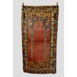 Konya prayer rug, central Anatolia, second half 20th century, 7ft. 8in. x 4ft. 2in. 2.34m. x 1.