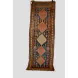 Malayer runner, north west Persia, circa 1920s-30s, 9ft. 7in. x 3ft. 4in. 2.92m. x 1.02m. Overall