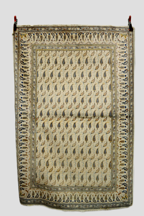 ‘Five-colour’ Kashan ivory field rug, west Persia, second half 20th century, 6ft. 7in. x 4ft. 6in.