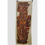 Ushak carpet fragment, west Anatolia, possibly 17th century, 2ft. 8in. x 8ft. 2in. 0.81m. x 2.49m.
