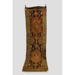 Karabakh runner, south west Caucasus, early 20th century, 11ft. 11in. x 3ft. 7in. 3.63m. x 1.09m.