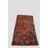Hamadan carpet, north west Persia, mid-20th century, 9ft. 2in. x 4ft. 11in. 2.80m. x 1.50m. Patch to