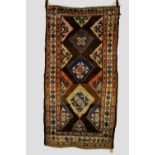 Kurdish rug, north west Persia, early 20th century, 6ft. 5in. x 3ft. 8in. 1.96m. x 1.04m. Overall