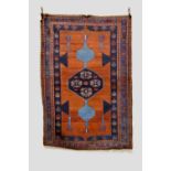 Unusual Kazak red and blue medallion rug, south west Caucasus, first half 20th century, 6ft. 11in. x