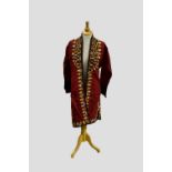 Two Tekke Turkmen silk embroidered coats, Turkmenistan, first half 20th century. The first red