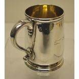 A George 1st silver mug, Britannia standard, engraved one side with a fox, the interior gilded, a