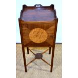 A George III mahogany bedside cupboard, the top with pierced handgrips to the gallery, the door
