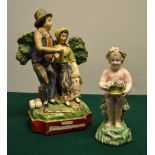 An early nineteenth century Staffordshire group, depicting a Jack Tar and his lass, seated on a