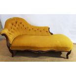An early Victorian rosewood show frame chaise lounge, upholstered mustard button back dralon, a