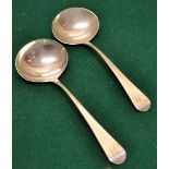 A pair of George III silver Old English pattern sauce ladles, engraved initials, having oval