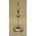 A Edward VIII large silver octagonal candlestick, the urn shape candle holder with a detachable