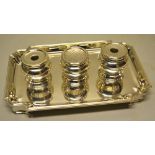 An Edward VIII silver inkstand in George II style, the rectangular standish engraved a crest with