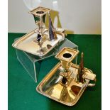 A pair of George III silver bedroom candlesticks, the rectangular bases and detachable