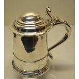 A George 1st Britannia Standard silver tankard, the body with a girdle moulding, the domed moulded h