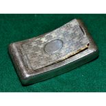 A George III silver hip shape snuff box, chased with florettes having a hinged lid and a gilded
