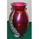 A Ryan Carling Studio ruby glass vase, decorated splashes of white droplets and bloomed in Loetz
